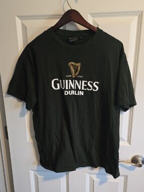 Guinness Dark Green Tee with White Logo and Gold Harp